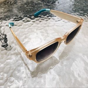 TOMS sunglasses.
